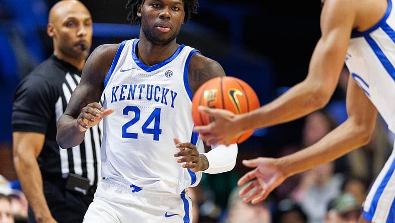Nov 29, 2022; Lexington, Kentucky, USA; Kentucky Wildcats forward Chris Livingston (24) grabs a pass from forward Jacob Toppin (0) during the first half against the Bellarmine Knights at Rupp Arena at Central Bank Center. Mandatory Credit: Jordan Prather-USA TODAY Sports