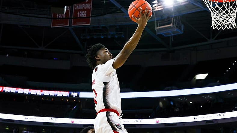 Nov 29, 2022; Raleigh, North Carolina, USA; North Carolina State Wolfpack guard Jarkel Joiner (1) dunks during the first half against William & Mary Tribe at PNC Arena. Mandatory Credit: Jaylynn Nash-USA TODAY Sports