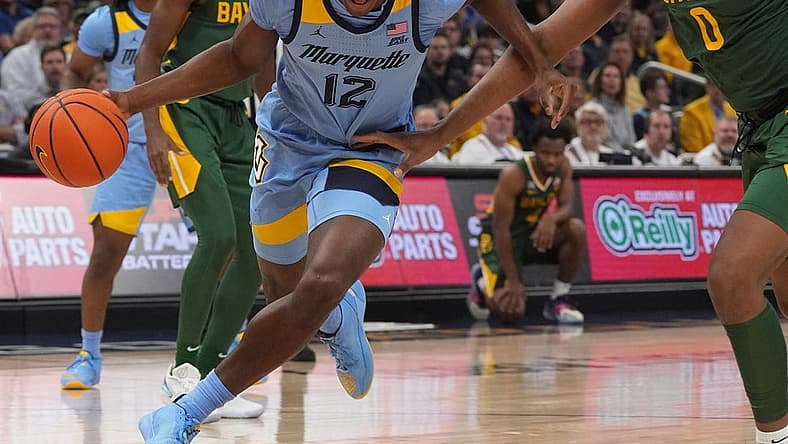 Marquette forward Olivier-Maxence Prosper (12) drives past Baylor forward Flo Thamba (0) during the first half of their game Tuesday, November 29, 2022 at Fiserv Forum in Milwaukee, Wis.
Mumen29 14