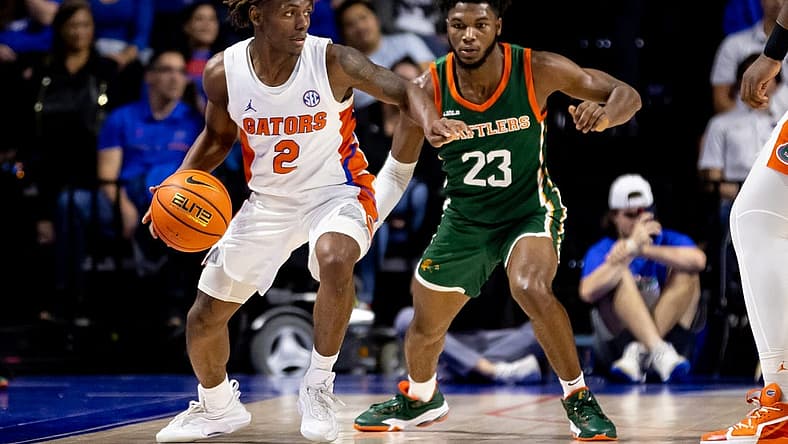 Nov 30, 2022; Gainesville, Florida, USA; Florida Gators guard Trey Bonham (2) dribbles the ball during the first half against the Florida A&M Rattlers at Exactech Arena at the Stephen C. O'Connell Center. Mandatory Credit: Matt Pendleton-USA TODAY Sports