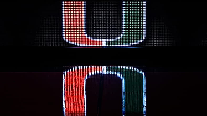Dec 8, 2020; Coral Gables, Florida, USA; A general view of a reflection of the Miami Hurricanes school logo on the scorers table prior to the game between the Miami Hurricanes and the Purdue Boilermakers at Watsco Center. Mandatory Credit: Jasen Vinlove-USA TODAY Sports
