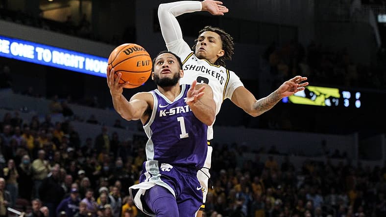 Kansas State's Markquis Nowell drives to the basket during the Wildcats' road game against the Wichita State Shockers Sunday at INTRUST Bank Arena. The Wildcats beat the Shockers 65-59.
B53f4199
