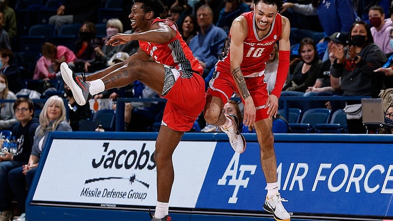 Feb 5, 2022; Colorado Springs, Colorado, USA; New Mexico Lobos guard Jaelen House (10) celebrates with guard Jamal Mashburn Jr. (5) after making a half court shot at the buzzer in the first half against the Air Force Falcons at Clune Arena. Mandatory Credit: Isaiah J. Downing-USA TODAY Sports