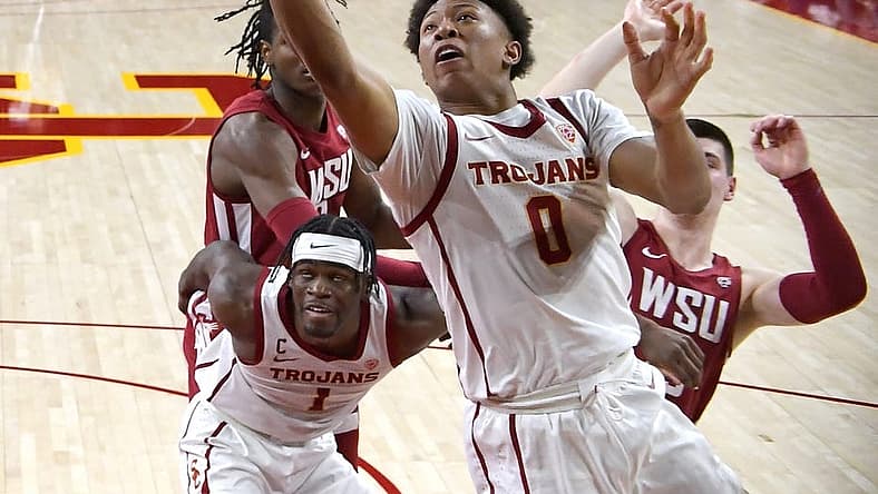 Feb 20, 2022; Los Angeles, California, USA; USC Trojans guard Boogie Ellis (0) drives up for a basket in the first half against the Washington State Cougars at Galen Center. Mandatory Credit: Jayne Kamin-Oncea-USA TODAY Sports