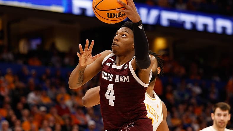Mar 13, 2022; Tampa, FL, USA; Texas A&M Aggies guard Wade Taylor IV (4) drives to the basket against the Tennessee Volunteers in the second half at Amelie Arena. Mandatory Credit: Nathan Ray Seebeck-USA TODAY Sports