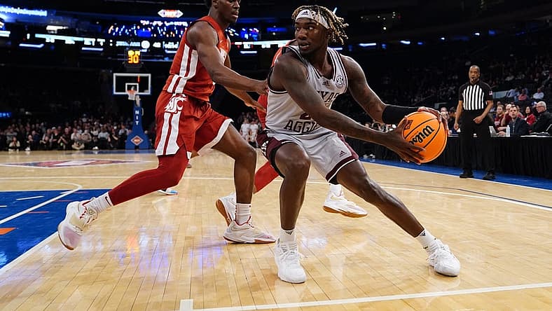 Mar 29, 2022; New York, New York, USA; Texas A&M Aggies guard Manny Obaseki (35) looks to make a move against Washington State Cougars guard TJ Bamba (5) during the second half of the NIT college basketball semifinals at Madison Square Garden. Mandatory Credit: Gregory Fisher-USA TODAY Sports