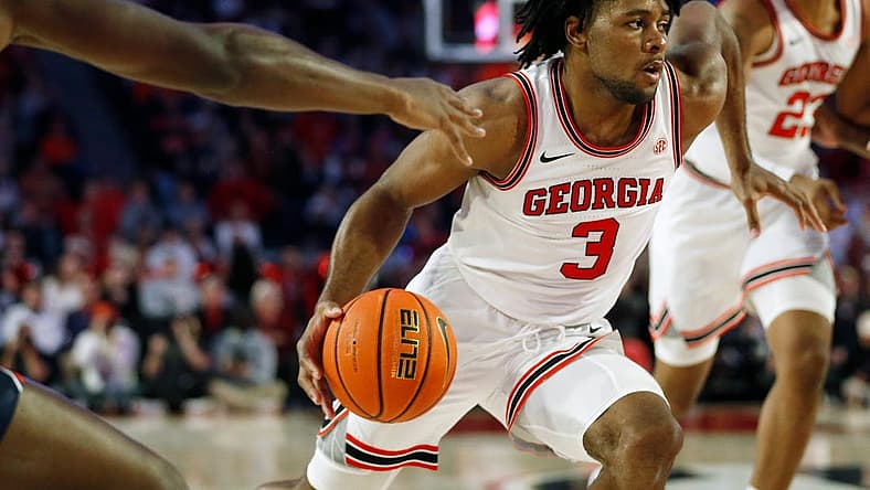 Feb. 5, 2022; Athens, Georgia, USA; Georgia Bulldogs guard Kario Oquendo (3) drives against the Auburn Tigers at Stegeman Coliseum. Joshua L. Jones/Athens Banner-Herald via USA TODAY NETWORK

Ncaa Basketball Auburn At Georgia