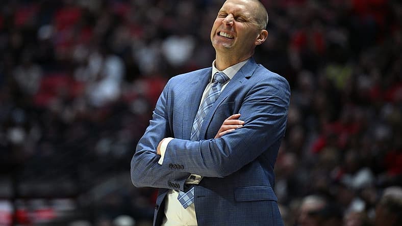 Nov 11, 2022; San Diego, California, USA; Brigham Young Cougars head coach Mark Pope reacts during the first half against the San Diego State Aztecs at Viejas Arena. Mandatory Credit: Orlando Ramirez-USA TODAY Sports