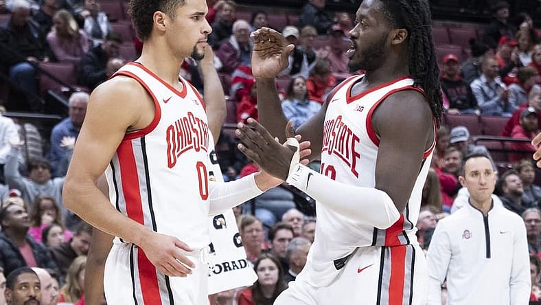 Nov 16, 2022; Columbus, Ohio, USA; Ohio State Buckeyes guard Tanner Holden (0) is congratulated by forward Brice Sensabaugh (10) after a three-point shot against Eastern Illinois Panthers in the second half at Value City Arena. Mandatory Credit: Greg Bartram-USA TODAY Sports