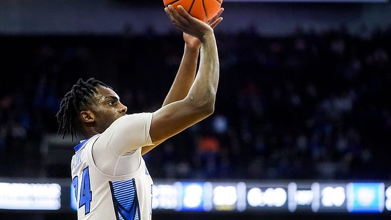Nov 17, 2022; Omaha, Nebraska, USA; Creighton Bluejays forward Arthur Kaluma (24) shoots a three-point basket during the first half against the UC Riverside Highlanders at CHI Health Center Omaha. Mandatory Credit: Dylan Widger-USA TODAY Sports
