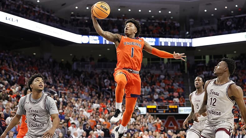 Nov 18, 2022; Auburn, Alabama, USA; Auburn Tigers guard Wendell Green Jr. (1) goes up for a shot against Texas Southern Tigers during the second half at Neville Arena. Mandatory Credit: John Reed-USA TODAY Sports