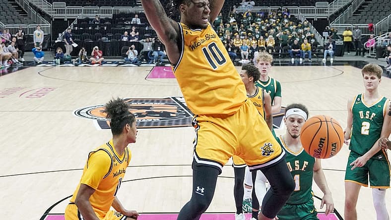 Nov 22, 2022; Kansas City, MO, USA; Wichita State Shockers guard Jaykwon Walton (10) dunks the ball against the San Francisco Dons during the second half at T-Mobile Center. Mandatory Credit: Denny Medley-USA TODAY Sports