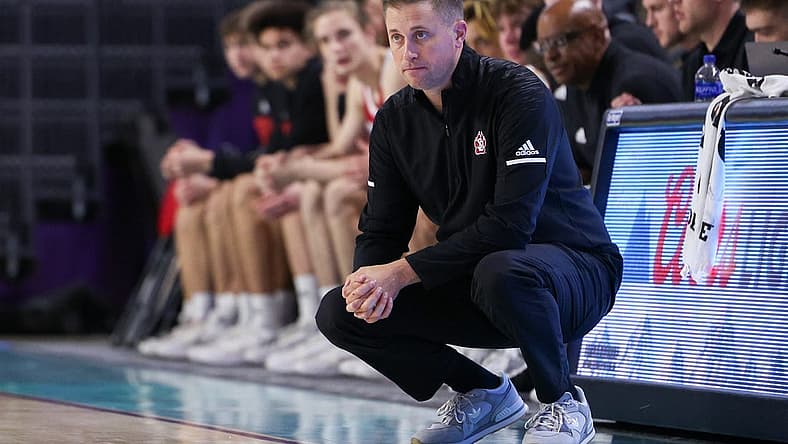 Nov 22, 2022; Fort Myers, Florida, USA; South Dakota Coyotes head coach Eric Peterson looks on in the second half against Long Island University during the Fort Myers Tip-Off at Suncoast Credit Union Arena. Mandatory Credit: Nathan Ray Seebeck-USA TODAY Sports
