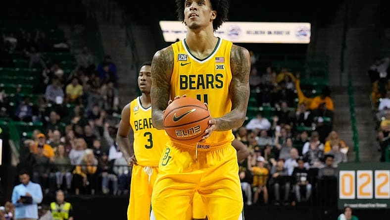 Nov 23, 2022; Waco, Texas, USA;  Baylor Bears forward Jalen Bridges (11) shoots a free throw against the McNeese State Cowboys during the second half at Ferrell Center. Mandatory Credit: Chris Jones-USA TODAY Sports
