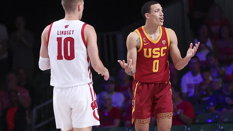 Nov 25, 2022; Paradise Island, BAHAMAS; USC Trojans forward Kobe Johnson (0) reacts in front of Wisconsin Badgers guard Isaac Lindsey (10) during the second half at Imperial Arena. Mandatory Credit: Kevin Jairaj-USA TODAY Sports