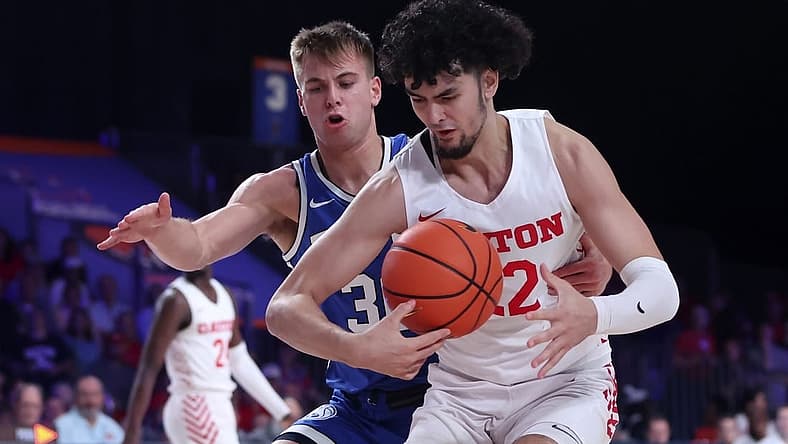 Nov 25, 2022; Paradise Island, BAHAMAS; Dayton Flyers forward Mustapha Amzil (22) controls the ball as Brigham Young Cougars guard Dallin Hall (30) defends during the first half at Imperial Arena. Mandatory Credit: Kevin Jairaj-USA TODAY Sports
