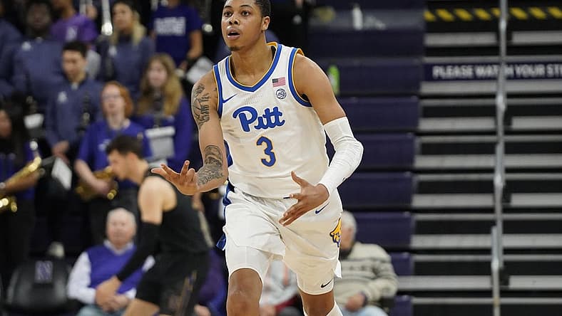 Nov 28, 2022; Evanston, Illinois, USA; Pittsburgh Panthers guard Greg Elliott (3) celebrates a three point basket against the Northwestern Wildcats during the second half at Welsh-Ryan Arena. Mandatory Credit: David Banks-USA TODAY Sports