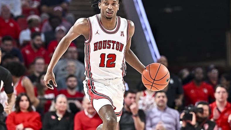 Nov 29, 2022; Houston, Texas, USA; Houston Cougars guard Tramon Mark (12) dribbles the ball during the second half against the Norfolk State Spartans at Fertitta Center. Mandatory Credit: Maria Lysaker-USA TODAY Sports
