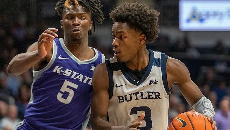 Kansas State Wildcats guard Cam Carter (5) and Butler Bulldogs guard Chuck Harris (3) under the basket at Hinkle Fieldhouse, Wednesday, Nov. 30, 2022, during Butler s 76-64 win over Kansas State.