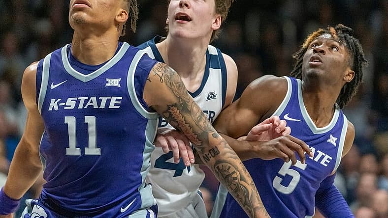 Kansas State Wildcats forward Keyontae Johnson (11), Butler Bulldogs guard Simas Lukosius (41) and Kansas State Wildcats guard Cam Carter (5) look for a rebound at Hinkle Fieldhouse, Wednesday, Nov. 30, 2022, during Butler s 76-64 win over Kansas State.
