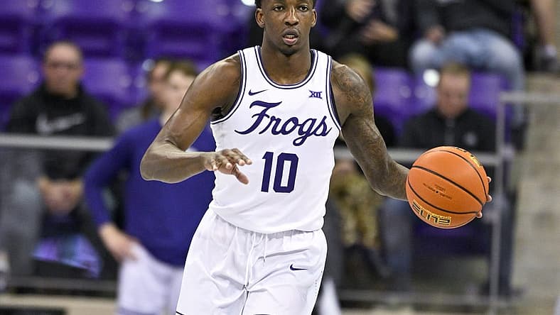Nov 30, 2022; Fort Worth, Texas, USA; TCU Horned Frogs guard Damion Baugh (10) brings the ball up court against the Providence Friars during the first half at Ed and Rae Schollmaier Arena. Mandatory Credit: Jerome Miron-USA TODAY Sports