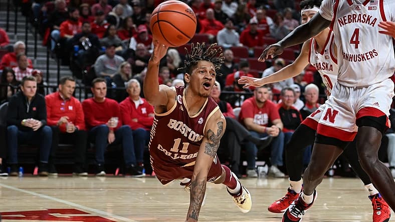 Nov 30, 2022; Lincoln, Nebraska, USA; Boston College Eagles guard Makai Ashton-Langford (11) saves a loose ball against the Nebraska Cornhuskers in the second half at Pinnacle Bank Arena. Mandatory Credit: Steven Branscombe-USA TODAY Sports