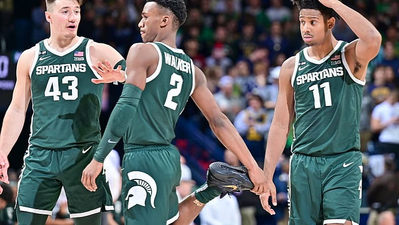 Nov 30, 2022; South Bend, Indiana, USA; Michigan State Spartans guard Jason Whitens (43) guard Tyson Walker (2) and guard A.J. Hoggard (11) prepare to start the second half against the Notre Dame Fighting Irish at the Purcell Pavilion. Mandatory Credit: Matt Cashore-USA TODAY Sports