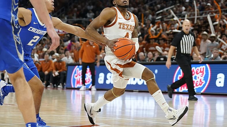 Dec 1, 2022; Austin, Texas, USA; Texas Longhorns guard Tyrese Hunter (4) drives to the basket during the first half against the Creighton Bluejays at Moody Center. Mandatory Credit: Scott Wachter-USA TODAY Sports