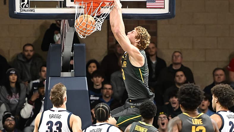 Dec 2, 2022; Sioux Falls, South Dakota, USA;  Baylor Bears forward Caleb Lohner (33) dunks against the Gonzaga Bulldogs in the first half at Sanford Pentagon. Mandatory Credit: Steven Branscombe-USA TODAY Sports