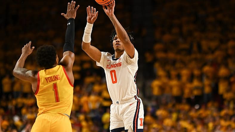 Dec 2, 2022; College Park, Maryland, USA; Illinois Fighting Illini guard Terrence Shannon Jr. (0) shoots over Maryland Terrapins guard Jahmir Young (1) during the first half at Xfinity Center. Mandatory Credit: Tommy Gilligan-USA TODAY Sports