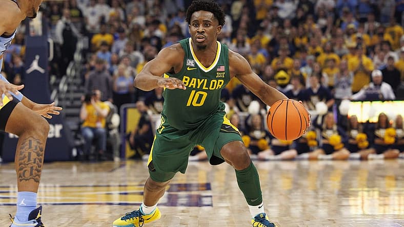 Nov 29, 2022; Milwaukee, Wisconsin, USA; Baylor Bears guard Adam Flagler (10) during the game against the Marquette Golden Eagles at Fiserv Forum. Mandatory Credit: Jeff Hanisch-USA TODAY Sports