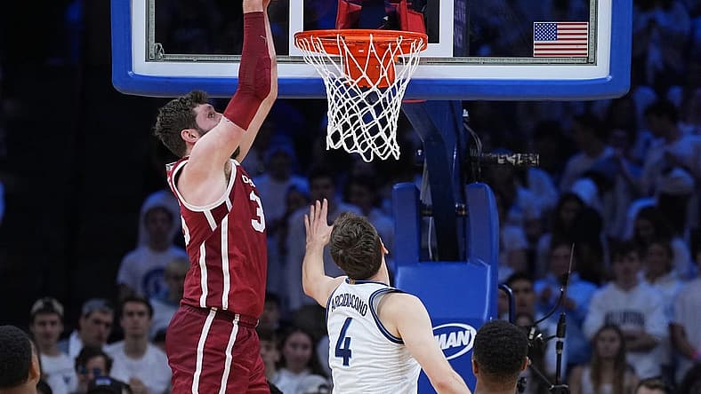 Dec 3, 2022; Philadelphia, Pennsylvania, USA; Oklahoma Sooners forward Tanner Groves (35) dunks the ball against Villanova Wildcats guard Chris Arcidiacono (4) during the second half at Wells Fargo Center. Mandatory Credit: Gregory Fisher-USA TODAY Sports