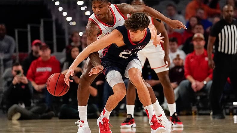 Dec 3, 2022; Fort Worth, Texas, USA; St. Mary's Gaels guard Aidan Mahaney (20) has the ball stolen by Houston Cougars guard Marcus Sasser (0) during the first half at Dickies Arena. Mandatory Credit: Chris Jones-USA TODAY Sports