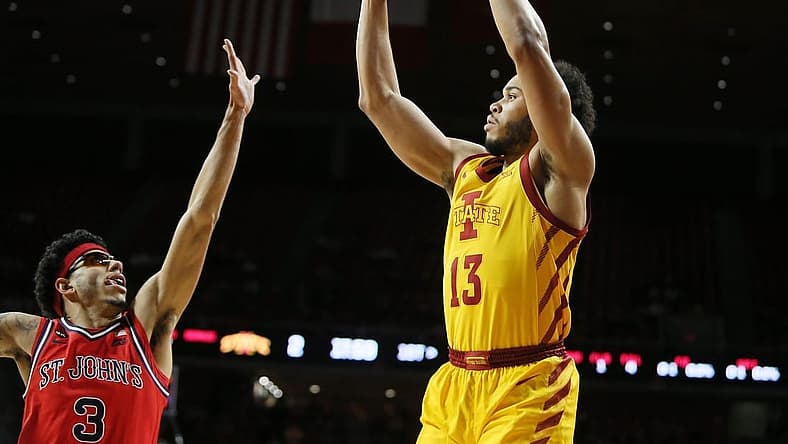 Iowa State University Cyclones guard Jaren Holmes (13) takes a three-point shot over St. Johns Red Storm guard Andre Curbelo (3) during the first half at Hilton Coliseum Sunday, Dec. 4, 2022, in Ames, Iowa. Photo by Nirmalendu Majumdar/Ames Tribune
St Jhon S And Iowa State Men S Basketball