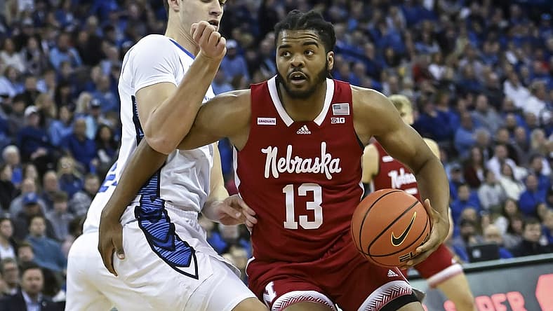 Dec 4, 2022; Omaha, Nebraska, USA; Nebraska Cornhuskers forward Derrick Walker (13) drives against Creighton Bluejays center Ryan Kalkbrenner (11) in the first half at CHI Health Center Omaha. Mandatory Credit: Steven Branscombe-USA TODAY Sports
