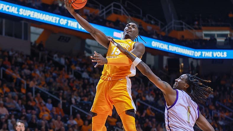 Dec 4, 2022; Knoxville, Tennessee, USA; Tennessee Volunteers guard Jahmai Mashack (15) goes to the basket against Alcorn State Braves forward Dontrell McQuarter (1) at Thompson-Boling Arena. Mandatory Credit: Randy Sartin-USA TODAY Sports