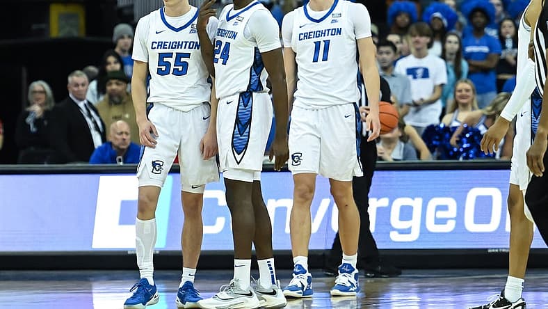 Dec 4, 2022; Omaha, Nebraska, USA; Creighton Bluejays forward Arthur Kaluma (24) and guard Baylor Scheierman (55) and center Ryan Kalkbrenner (11) looks to the bench against the Nebraska Cornhuskers in the first half at CHI Health Center Omaha. Mandatory Credit: Steven Branscombe-USA TODAY Sports