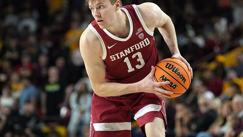 Dec 4, 2022; Tempe, Arizona, USA; Stanford Cardinal guard Michael Jones (13) controls the ball against the Arizona State Sun Devils during the first half at Desert Financial Arena. Mandatory Credit: Joe Camporeale-USA TODAY Sports