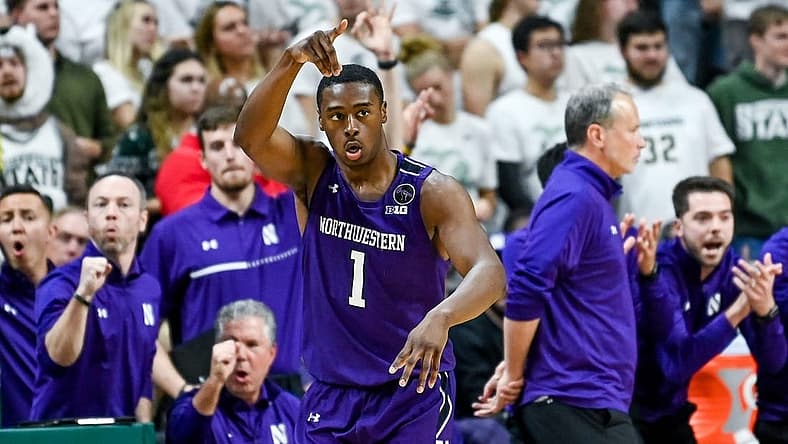 Northwestern's Chase Audige celebrates after a 3-pointer against Michigan State during the second half on Sunday, Dec. 4, 2022, in East Lansing.
221204 Msu Northwestern Bball 124a