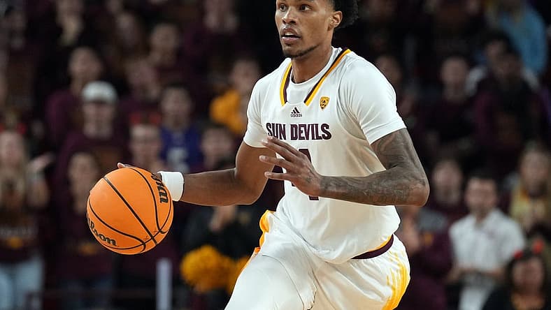 Dec 4, 2022; Tempe, Arizona, USA; Arizona State Sun Devils guard Desmond Cambridge Jr. (4) dribbles against the Stanford Cardinal during the second half at Desert Financial Arena. Mandatory Credit: Joe Camporeale-USA TODAY Sports