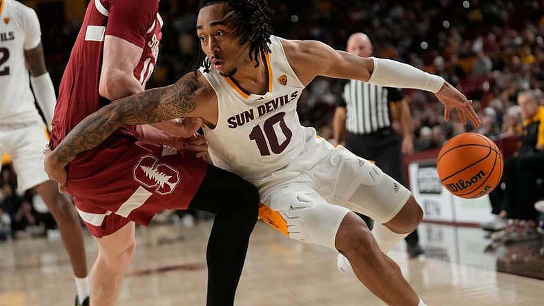 Dec 4, 2022; Tempe, Arizona, USA; Arizona State guard Frankie Collins (10) is defended by Stanford forward Max Murrell (10) during Pac 12 play at Desert Financial Arena. Mandatory Credit: Michael Chow-Arizona Republic
Basketball Asu Stan Stanford At Arizona State