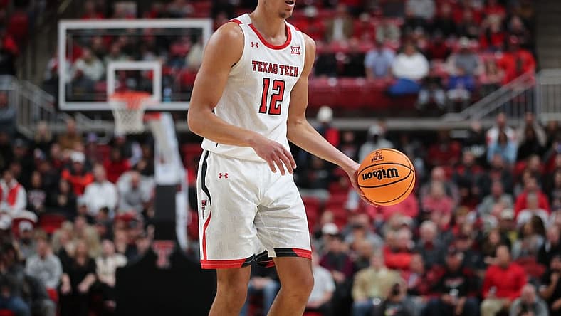Nov 30, 2022; Lubbock, Texas, USA; Texas Tech Red Raiders forward Daniel Batcho (12) dribbles the ball against the Georgetown Hoyas in the second half at United Supermarkets Arena. Mandatory Credit: Michael C. Johnson-USA TODAY Sports