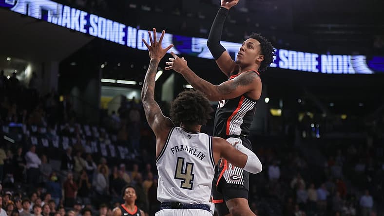 Dec 6, 2022; Atlanta, Georgia, USA; Georgia Bulldogs center Braelen Bridges (23) shoots against the Georgia Tech Yellow Jackets in the first half at McCamish Pavilion. Mandatory Credit: Brett Davis-USA TODAY Sports