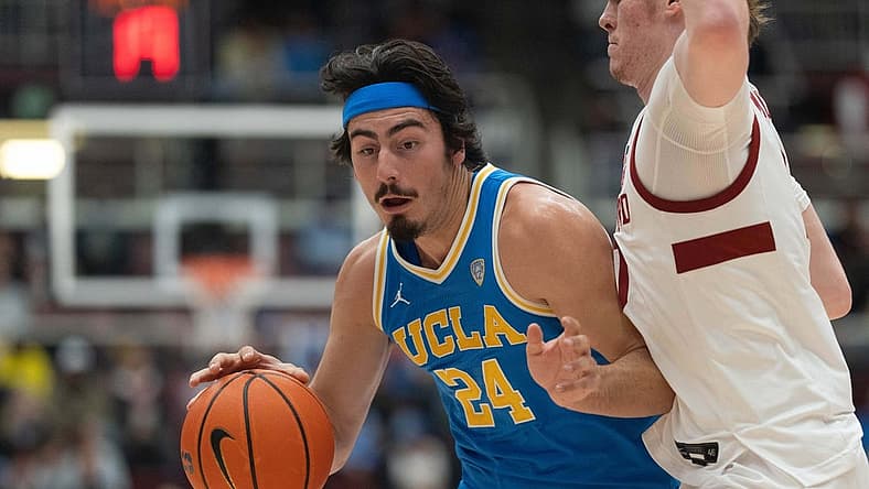 Dec 1, 2022; Stanford, California, USA; UCLA Bruins guard Jaime Jaquez Jr. (24) drives the ball around Stanford Cardinal forward Max Murrell (10) during the first half at Maples Pavilion. Mandatory Credit: Stan Szeto-USA TODAY Sports