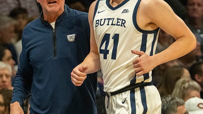 Butler Bulldogs head coach Thad Matta chats with Butler Bulldogs guard Simas Lukosius (41) at Hinkle Fieldhouse, Tuesday, Dec. 6, 2022, as Yale loses to the Butler men, 61-71.