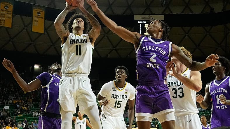 Dec 6, 2022; Waco, Texas, USA; Baylor Bears forward Jalen Bridges (11) looks to score against Tarleton Texans guard Freddy Hicks (2) during the first half at Ferrell Center. Mandatory Credit: Chris Jones-USA TODAY Sports