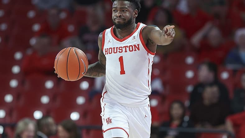 Dec 6, 2022; Houston, Texas, USA; Houston Cougars guard Jamal Shead (1) dribbles the ball during the first half against the North Florida Ospreys at Fertitta Center. Mandatory Credit: Troy Taormina-USA TODAY Sports