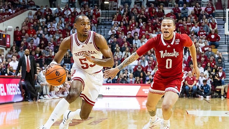 Dec 7, 2022; Bloomington, Indiana, USA; Indiana Hoosiers guard Tamar Bates (53) dribbles the ball while Nebraska Cornhuskers guard C.J. Wilcher (0) defends in the first half at Simon Skjodt Assembly Hall. Mandatory Credit: Trevor Ruszkowski-USA TODAY Sports