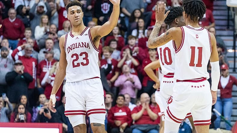 Dec 7, 2022; Bloomington, Indiana, USA; Indiana Hoosiers forward Trayce Jackson-Davis (23) celebrates the third ever triple double in Indiana Hoosiers history with teammates in the second half against the Nebraska Cornhuskers at Simon Skjodt Assembly Hall. Mandatory Credit: Trevor Ruszkowski-USA TODAY Sports