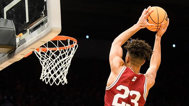 Indiana's Trayce Jackson-Davis (23) catches an alley-oop pass for a dunk during the second half of the Indiana versus Wyoming NCAA First Four tournament game at University of Dayton Arena on Tuesday, March 15, 2022.

Iu Wu Bb Ff 2h Tjd 3